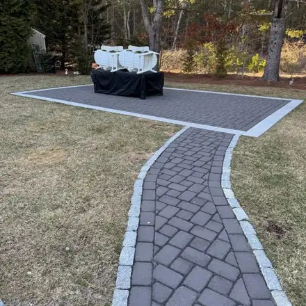 Paver walkway and pad with granite border
